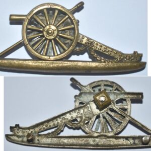 B03/007. LARGE CANON POUCH BADGE, brass