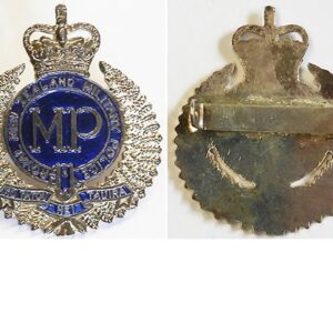 B08/239. ROYAL NZ MILITARY POLICE white metal and blue cap badge