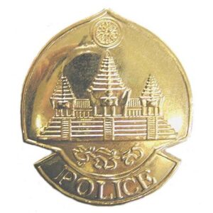 CAM614. CAMBODIA – KPNLAF POLICE HAT BADGE, gilt finish