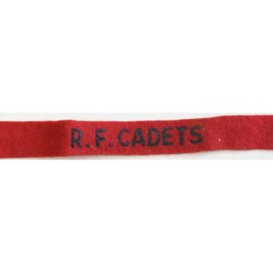 CST030. R.F.CADET, black printed on red wool, small size, unused