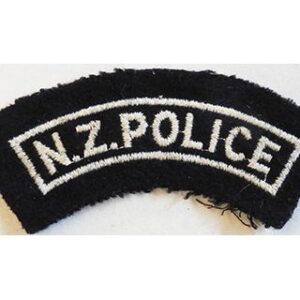 CST090. N.Z.POLICE white cotton woven on black wool