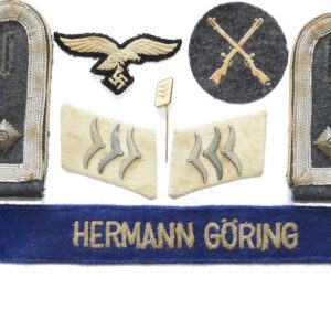 GC1450. SET OF HERMANN GORING PANZER REGIMENT INSIGNIA